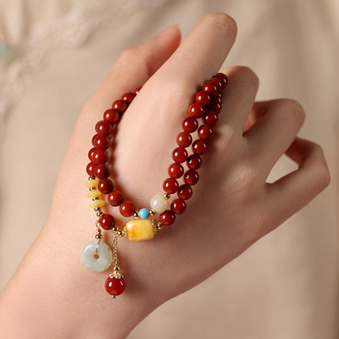 Prosperity & Peace Double-Wrap Bracelet – Red Agate with Jade Donut & Amber Charms