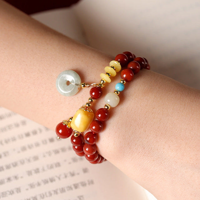 Prosperity & Peace Double-Wrap Bracelet – Red Agate with Jade Donut & Amber Charms