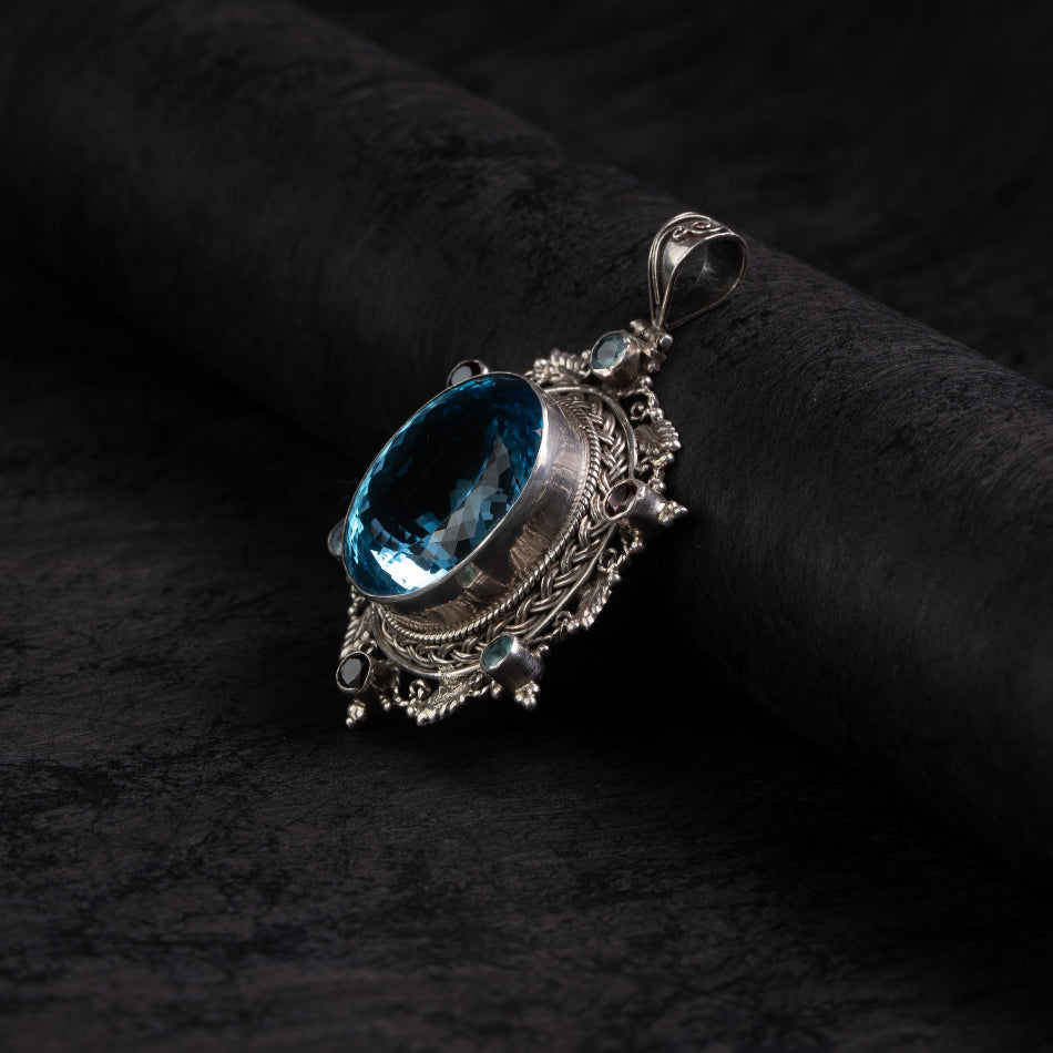 Blue Topaz Starburst Silver Pendant – Clarity & Expression