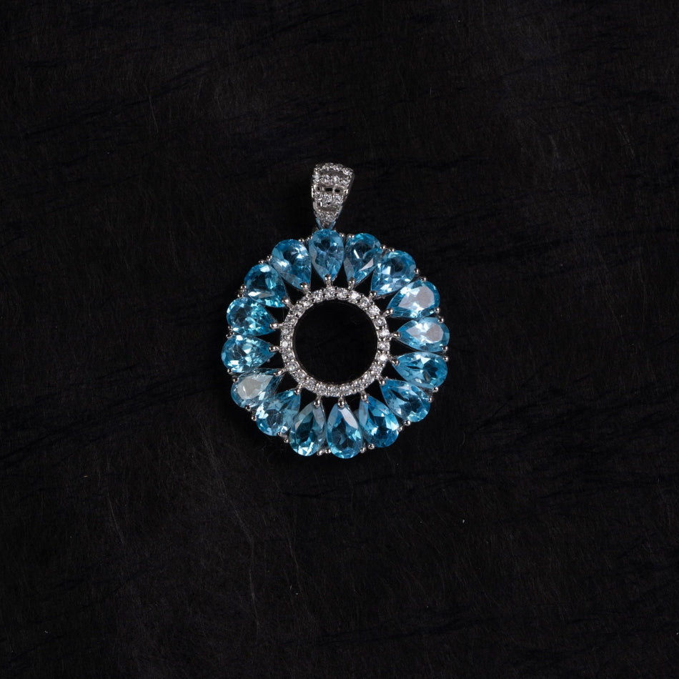 Blue Topaz Halo Circle Silver Pendant – Clarity & Expression