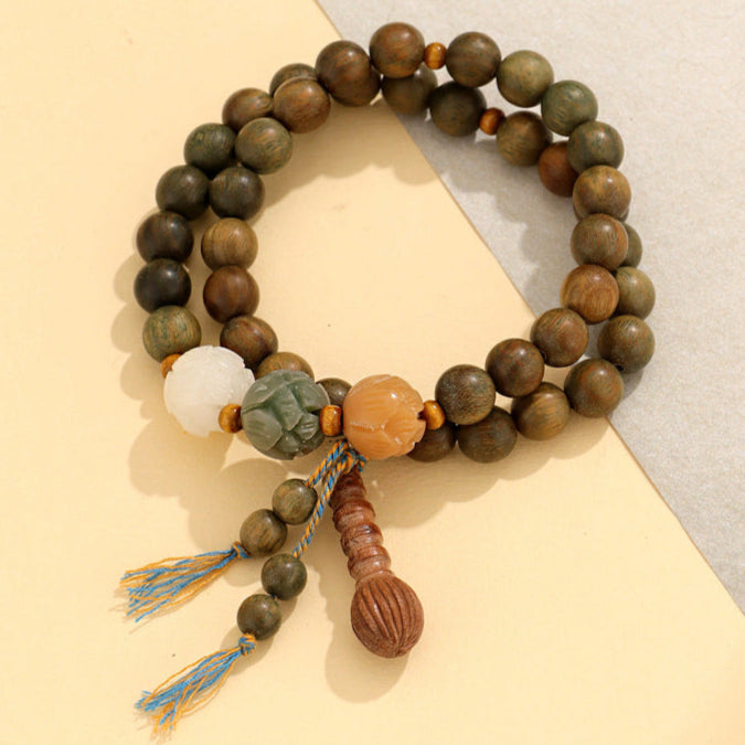 Double-Wrap Wooden Mala Bracelet with Lotus Carvings & Tassel – Spiritual Balance