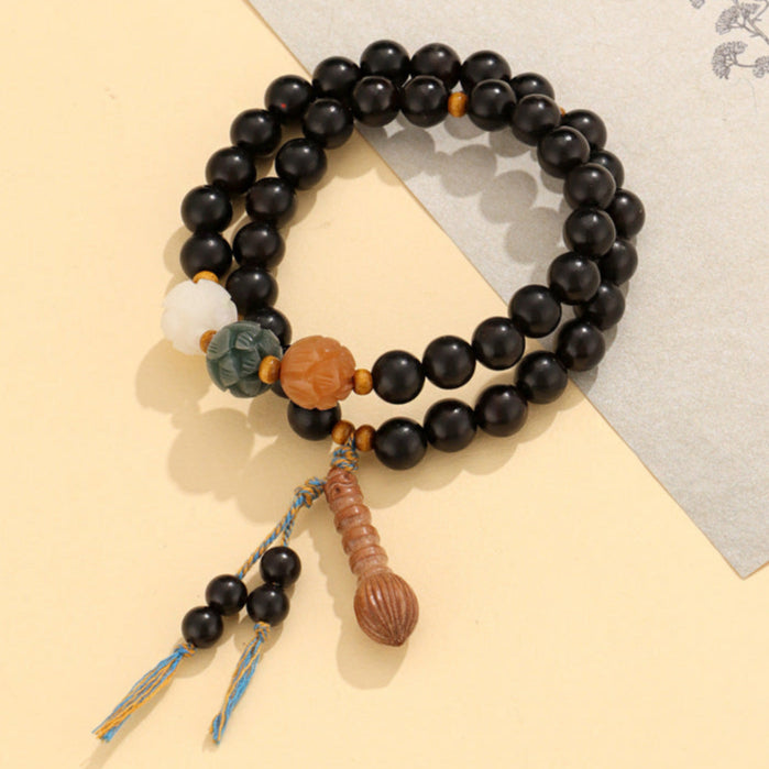 Double-Wrap Wooden Mala Bracelet with Lotus Carvings & Tassel – Spiritual Balance